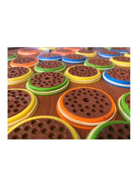 Disposable shower heads designed to drain dry when not in use copper backed and sleeved to aid in the suppression and control of Legionella bacteria